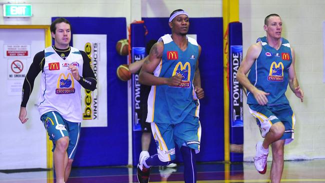 Crocs training at Crocs club Wulguru. Townsville Crocodiles back-up point guard Kelvin Robertson, left, and starters Rosell Ellis and John Rillie at the Wulguru training court yesterday in their last session before taking on the Breakers at The Swamp tonight.