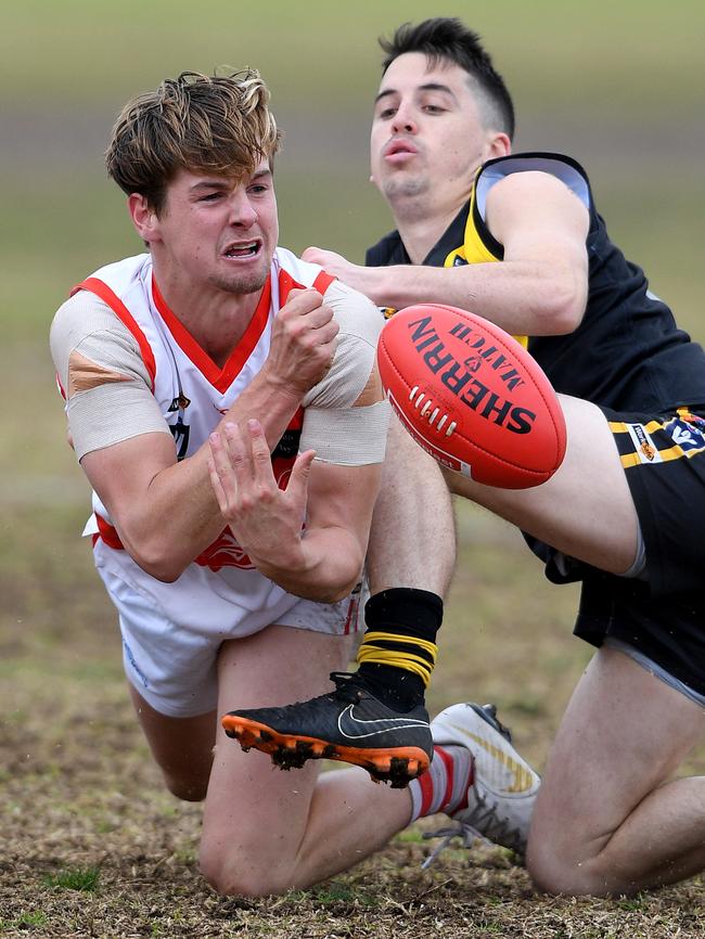 Chad Harris fires out a handball for Sorrento.