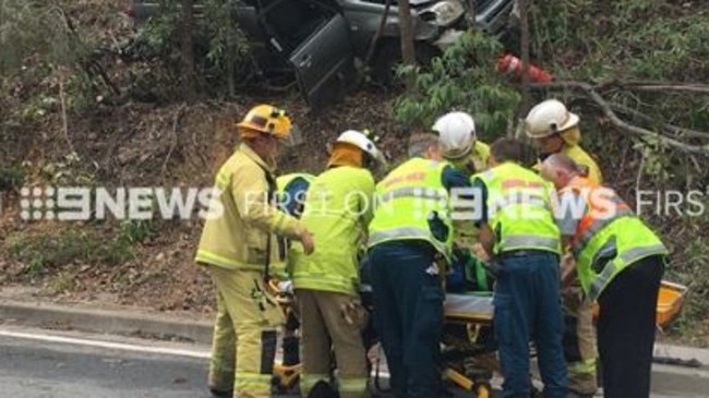 Emergency services crews at the scene of a crash at Tamborine Oxenford Road. Photo: Channel 9