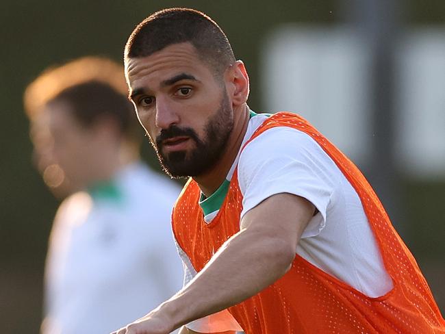 DOHA, QATAR - JANUARY 10: Aziz Behich of Australia runs with the ball during an Australia Socceroos training session ahead of the the AFC Asian Cup at Qatar University Field 11 on January 10, 2024 in Doha, Qatar. (Photo by Robert Cianflone/Getty Images)