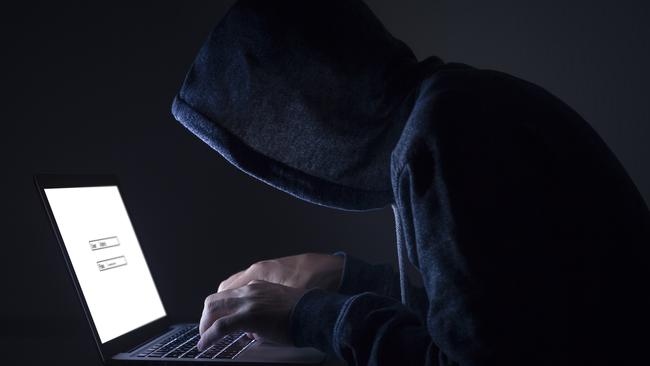 Hacker performing cyber attack on laptop Picture: iStock