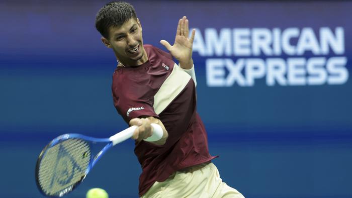 NEW YORK, NEW YORK - AUGUST 30: Alexei Popyrin of Australia against Novak Djokovic of Serbia during their Men's Singles Third Round match on Day Five of the 2024 US Open at USTA Billie Jean King National Tennis Center on August 30, 2024 in the Flushing neighborhood of the Queens borough of New York City.  (Photo by Jean Catuffe/Getty Images)