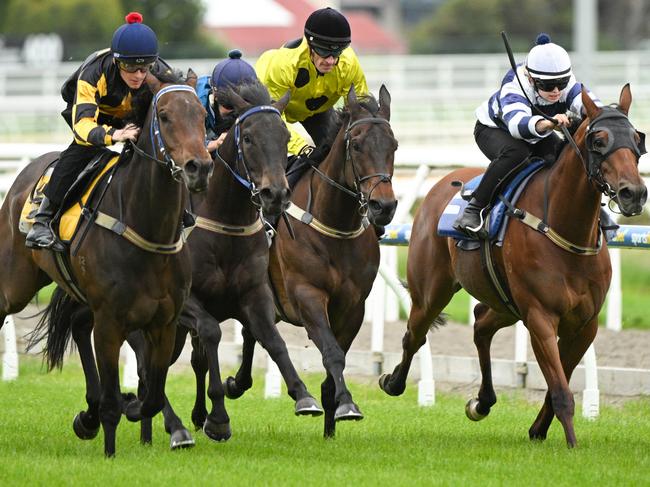 MELBOURNE, AUSTRALIA - NOVEMBER 20: Mark Zahra riding Without A Fight (Yellow, Black Spots) during jumpouts at Mornington Racecourse on November 20, 2024 in Melbourne, Australia.  (Photo by Vince Caligiuri/Getty Images)