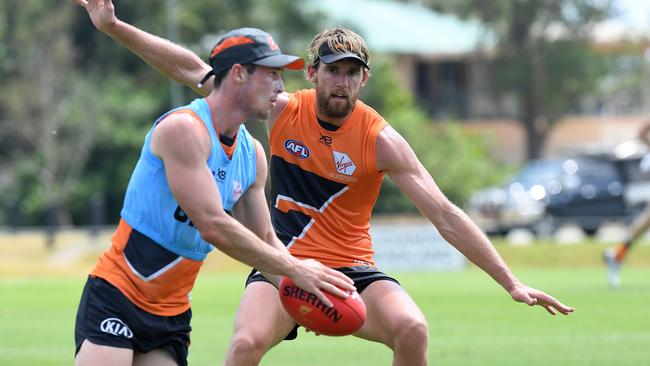 Lachie Ash, with the ball at Giants training at the Maroochydore Multi Sports Complex.