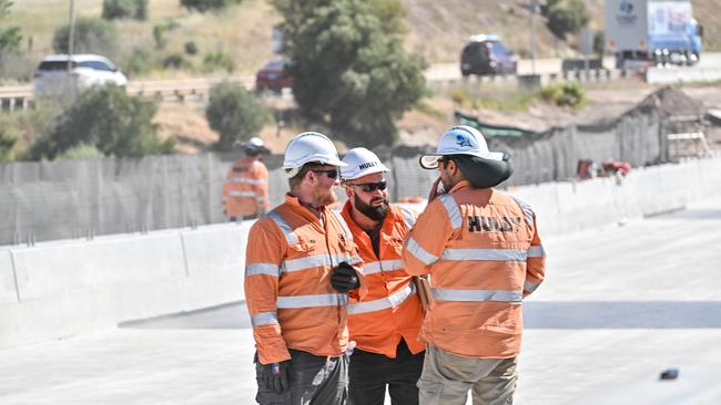 Hully construction workers on the new Pedler Creek Bridge on Main South Rd at Seaford Heights. Picture: NCA NewsWire / Brenton Edwards