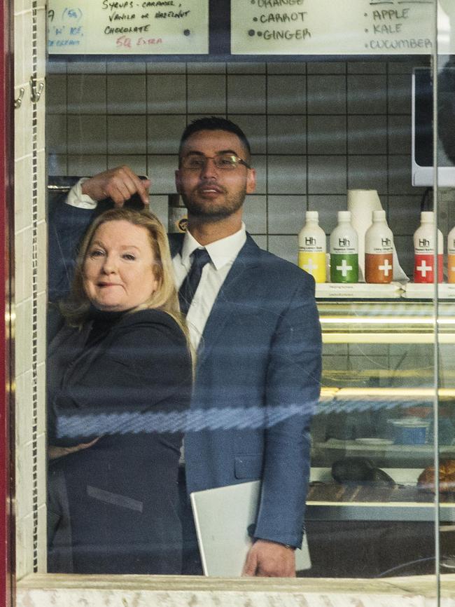 Salim Mehajer in coffee shop, checking