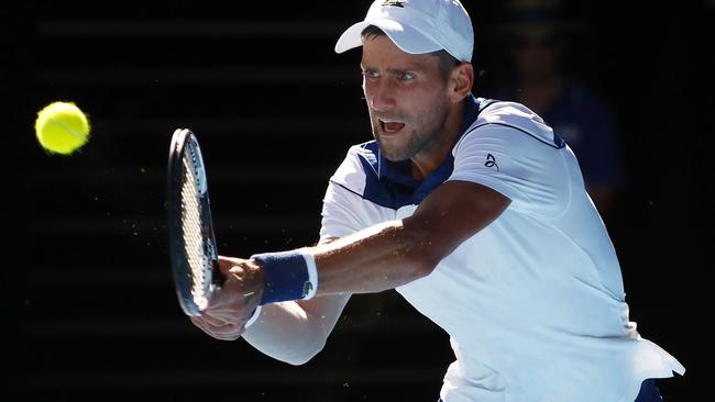 Australian Open Tennis 2018 - Day 4. Novak Djokovic vs Gael Monfils. Novak Djokovic backhand .Pic: Michael Klein