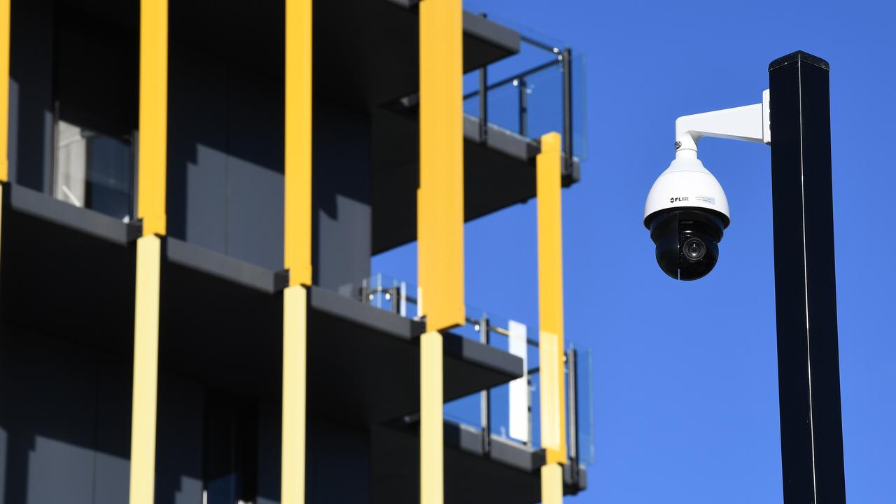 The company running the schools trial says it will use existing technology to be able to locate students on school grounds. This a security camera – which is one way of monitoring where people are – used in the athletes’ village during the recent Gold Coast Commonwealth Games. Picture: AAP