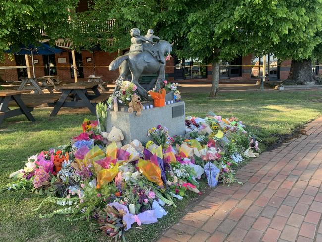 Flowers and stuffed toys were left at the pub by locals and tourists to pay tribute to the five lives tragically lost at The Royal Daylesford Hotel. Picture: Helena Powell