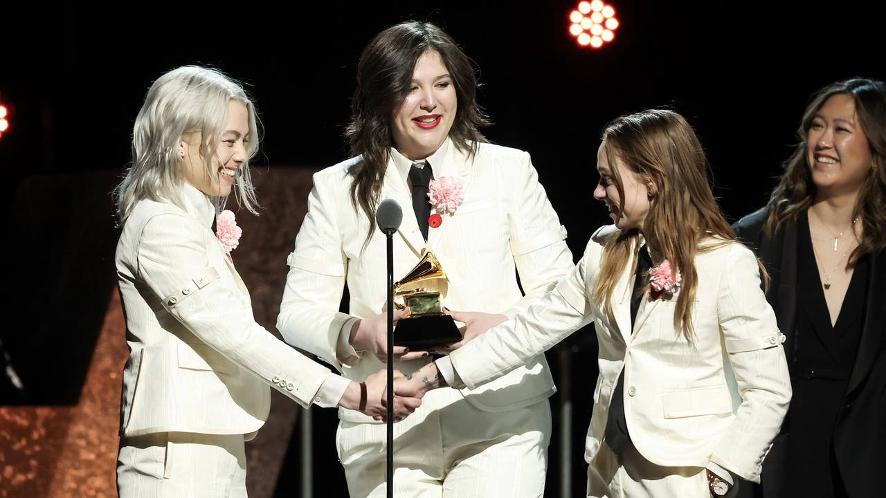 Phoebe Bridgers, Lucy Dacus and Julien Baker of Boygenius onstage during the 66th Grammy Awards. Picture: Leon Bennett/Getty Images