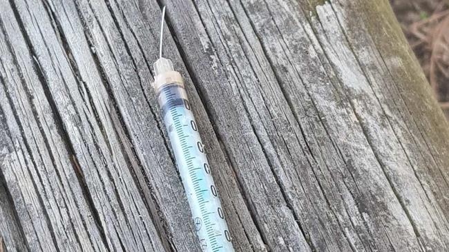 One of the two syringes found at the Spit this morning. It appears to be bent spreading fears someone may have unknowingly stepped on it.