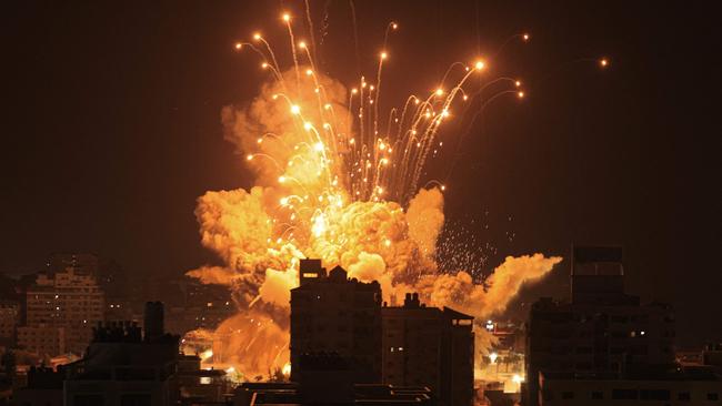 A missile explodes in Gaza City during an Israeli air strike on October 8, 2023. Picture: Mahmud Hams/AFP