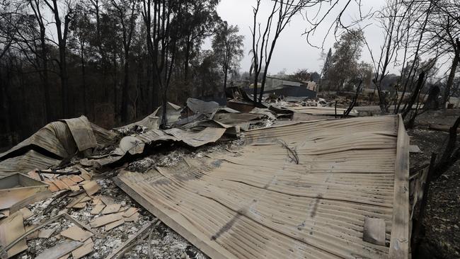 Houses are flattened at Conjola Park, Australia, after recent wildfires ravaged the community. Photo: Rick Rycroft/AAP