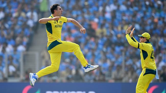 Cummins celebrates the wicket of Shreyas Iyer in the World Cup final against India. (Photo by Gareth Copley/Getty Images)