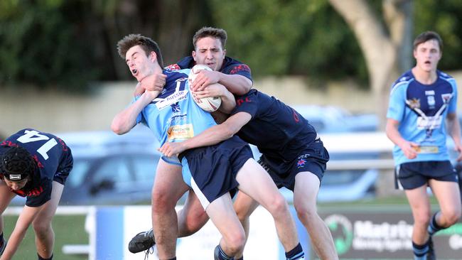 Titans Schools League rugby league clash between Aquinas (Red/Black) vs. Marymount (Blue) at Southport Tigers Rugby League Club. Luke Browne taken high. The offender was binned for 10. 24 May 2021 Southport Picture Richard Gosling