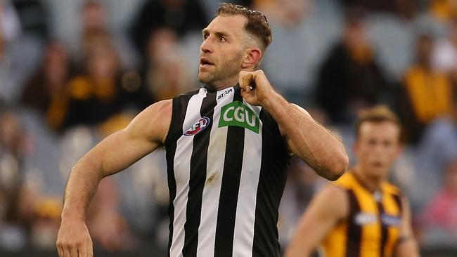 Travis Cloke shows his love for the Collingwood jumper. Picture: Wayne Ludbey