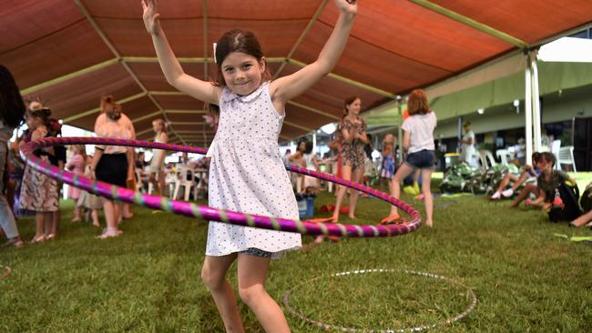 Eva Tynan, 7, shows off her hula hooping skills at the Chief Minister's Cup Day at the Darwin Turf Club on Saturday, July 15.