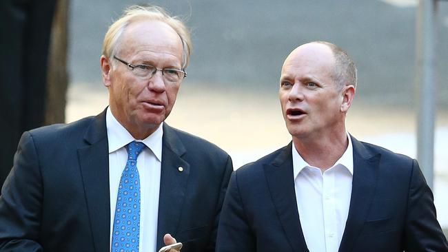 Former premiers Peter Beattie (left) and Campbell Newman are both expecting a Labor win.