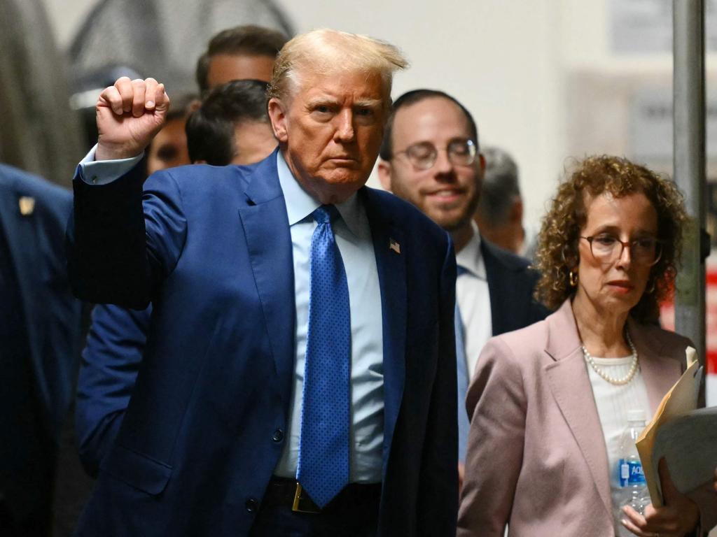 Former US President Donald Trump, with his lawyer Susan Necheles (R), returns to the court. (Photo by ANGELA WEISS / POOL / AFP)
