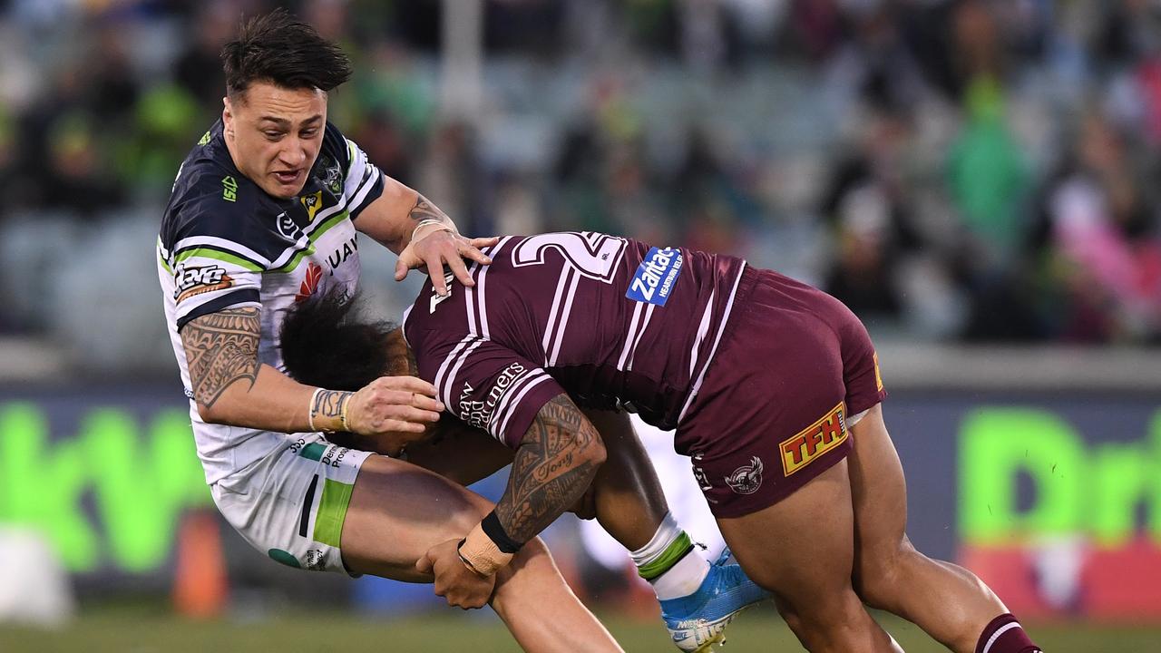 Jorge Taufua of the Sea Eagles tackles Charnze Nicoll-Klokstad