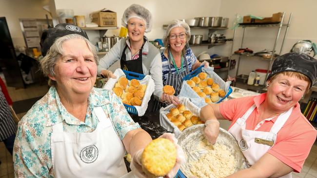 <s1>Recipe for success: CWA members Joy Davis, Susan Campbell, Anne Wilson and Anne DuVe mix up the dough for their famous scones at last year’s Melbourne Show.</s1> Picture: Tim Carrafa