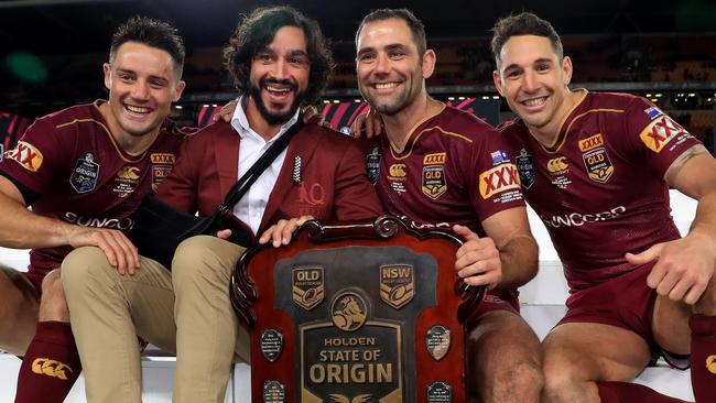 Cooper Cronk, Johnathan Thurston, Cameron Smith and Billy Slater celebrate another Origin triumph. Pics Adam Head