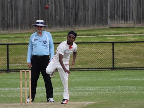 Caleb Candappa bowling for Moorabbin.