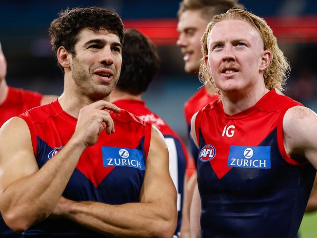 MELBOURNE, AUSTRALIA - APRIL 29: Clayton Oliver and Christian Petracca of the Demons are seen during the 2023 AFL Round 07 match between the Melbourne Demons and the North Melbourne Kangaroos at the Melbourne Cricket Ground on April 29, 2023 in Melbourne, Australia. (Photo by Dylan Burns/AFL Photos via Getty Images)