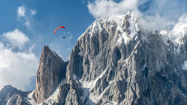 Alex Yaschenko paragliding in the Hunza Valley in Pakistan.