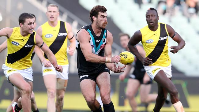 The Tigers haven’t recalled Mabior Chol, right, who rucked against Port Adelaide’s Scott Lycett the last time the two sides met. Picture: Sarah Reed