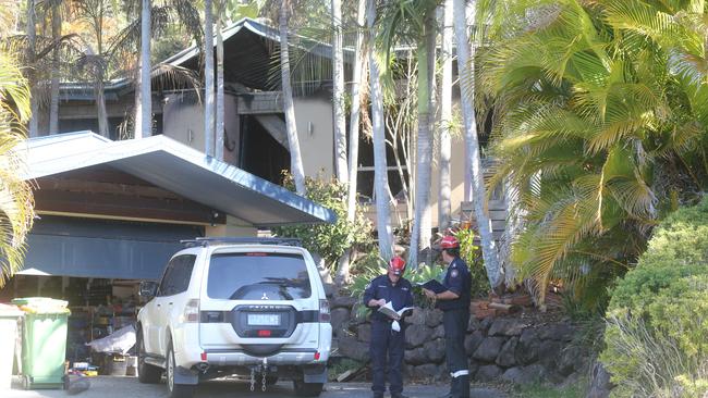 Fire investigators at the scene of the blaze in Stanfield Drive, Upper Coomera. Picture: Richard Gosling.