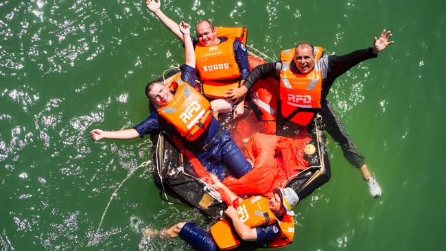 Woolgoolga marine rescue members train with liferaft recovery at coffs Harbour Jetty Pic Lto R:Mitch Harvey Greg McIntosh (Woopi) Simon Filet Rudi Hombergen (Coffs)Photo: Trevor Veale / The Coffs Coast Advocate