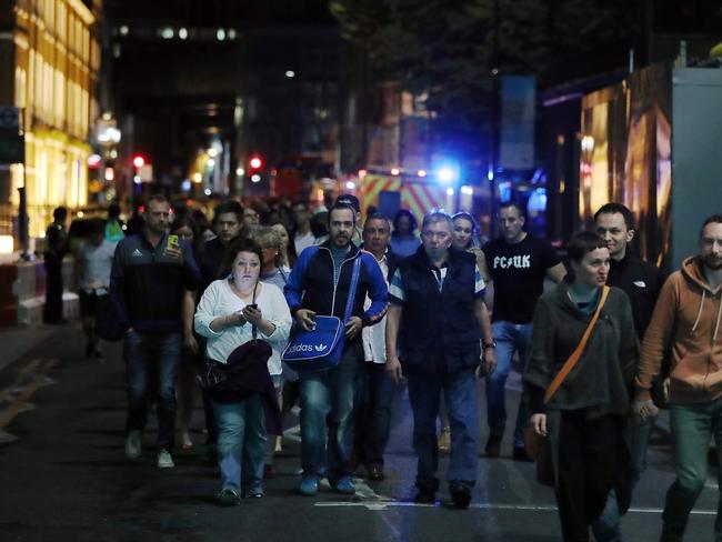 Members of the public are led away from the scene near London Bridge. Picture: Getty