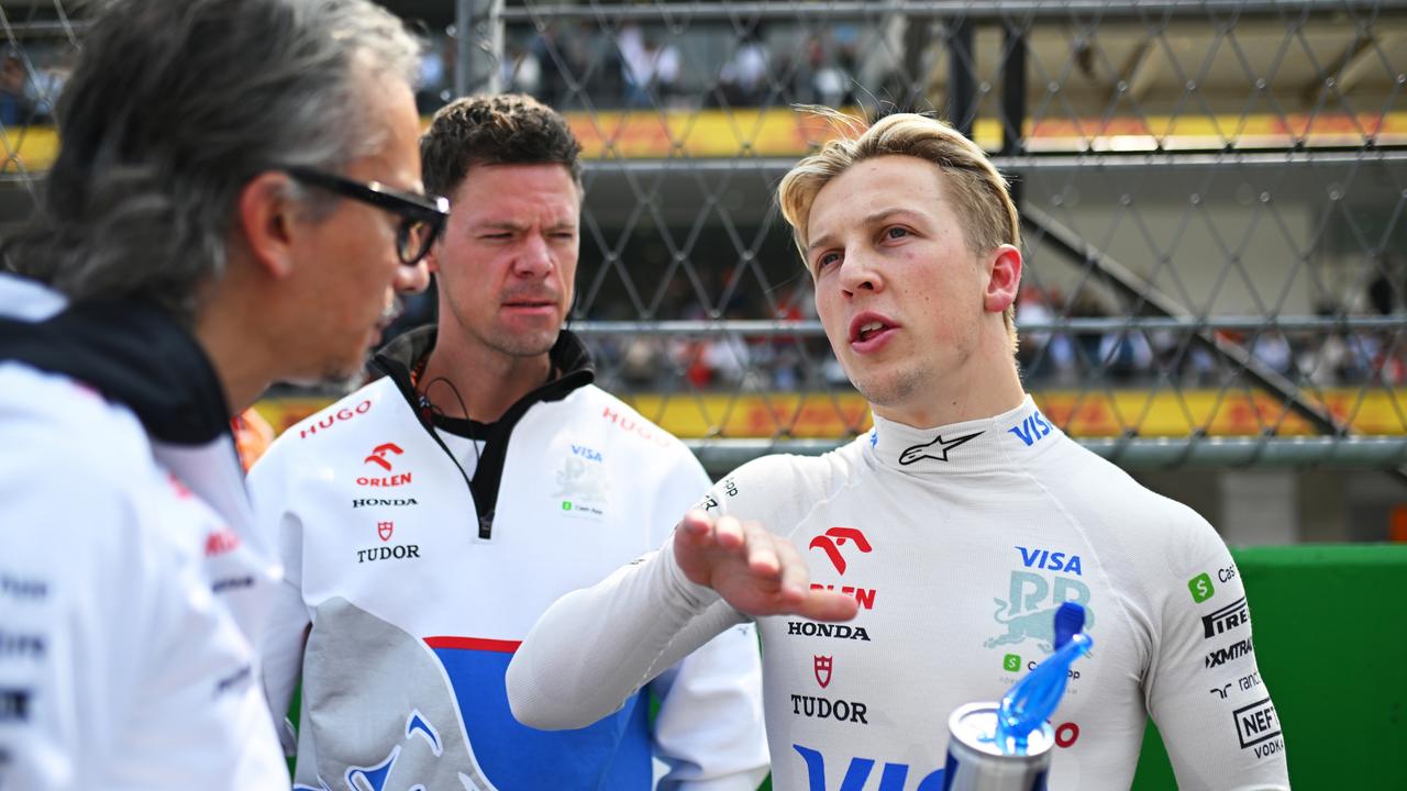 MEXICO CITY, MEXICO - OCTOBER 27: Liam Lawson of New Zealand and Visa Cash App RB talks to Laurent Mekies, Team Principal of Visa Cash App RB on the grid prior to the F1 Grand Prix of Mexico at Autodromo Hermanos Rodriguez on October 27, 2024 in Mexico City, Mexico. (Photo by Rudy Carezzevoli/Getty Images)