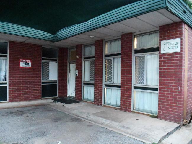Broken glass is seen at the front of the Palms Motel. Picture: Keri Megelus