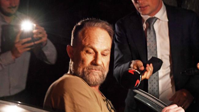 Michael Slater avoids reporters as he leaves Maroochydore watch-house. Picture: Patrick Woods.
