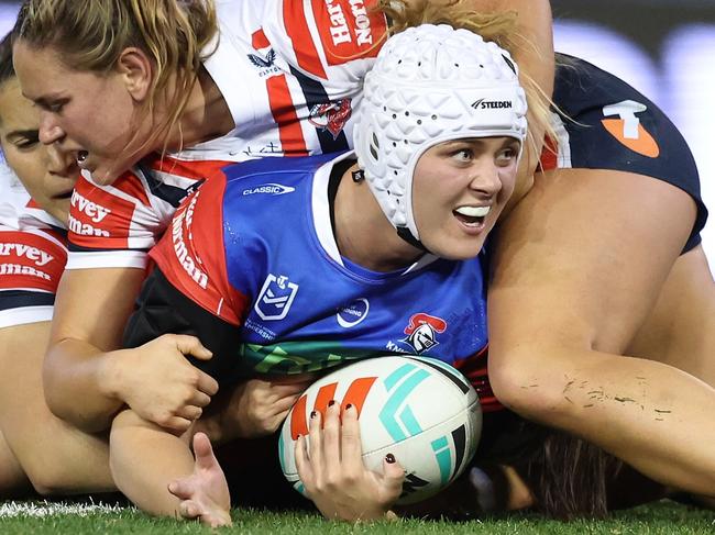 NEWCASTLE, AUSTRALIA - JULY 25: Hannah Southwell of the Knights is tackled during the round one NRLW match between Newcastle Knights and Sydney Roosters at McDonald Jones Stadium on July 25, 2024 in Newcastle, Australia. (Photo by Scott Gardiner/Getty Images)