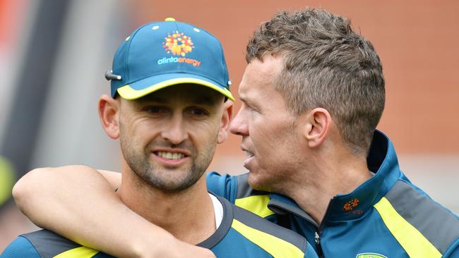 Nathan Lyon, left, with paceman Peter Siddle at Adelaide Oval yesterday