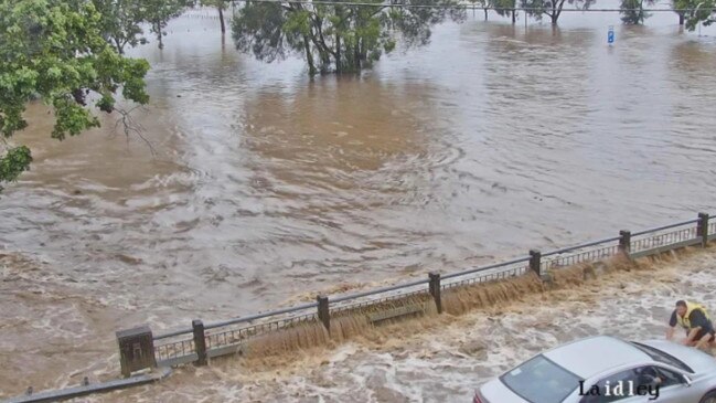 QFES helped safe person from flood waters at Laidley about 10am Friday after their vehicle was swept away. Pic: Lockyer Valley Regional Council flood camera