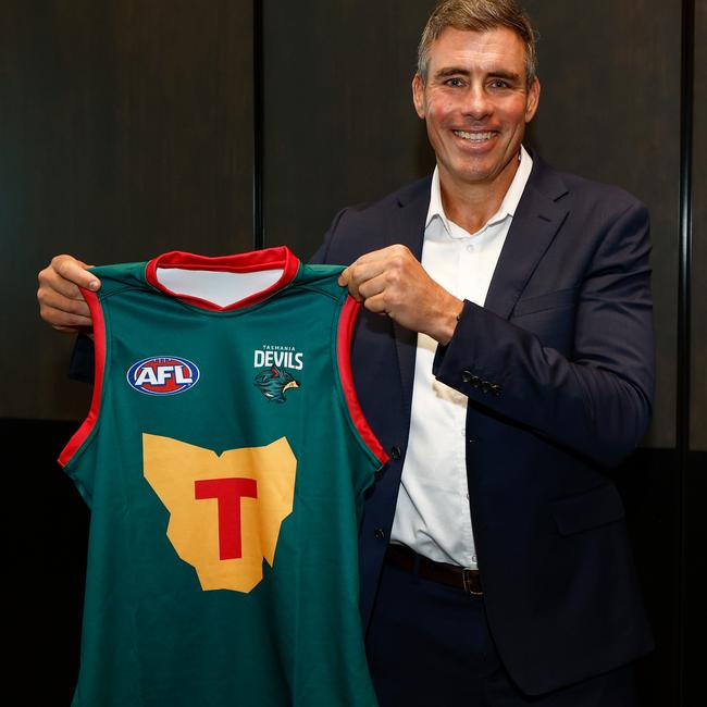 DEVONPORT, AUSTRALIA - MARCH 18: Matthew Richardson poses with The Tasmania Devils inaugural jumper during the Tasmania Football Club Launch at Paranaple Convention Centre on March 18, 2024 in Devonport, Australia. (Photo by Michael Willson/AFL Photos via Getty Images)