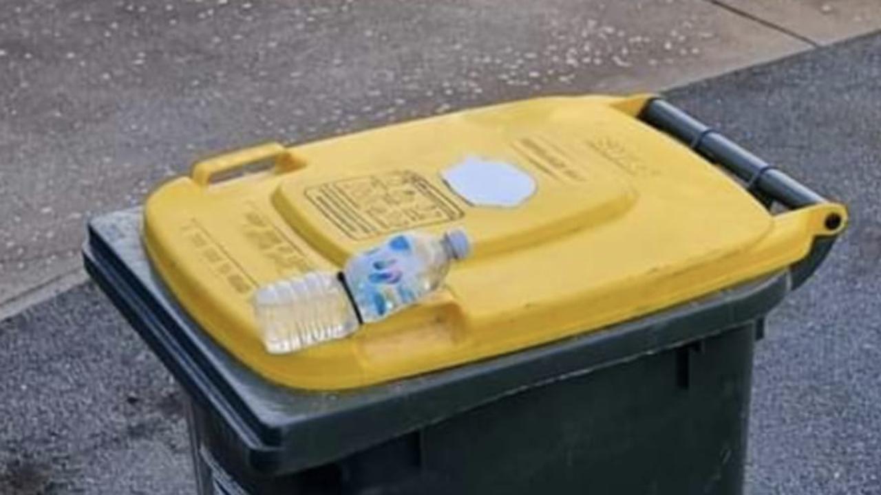 The council warned against using makeshift items to weigh down lids. Picture: Supplied.