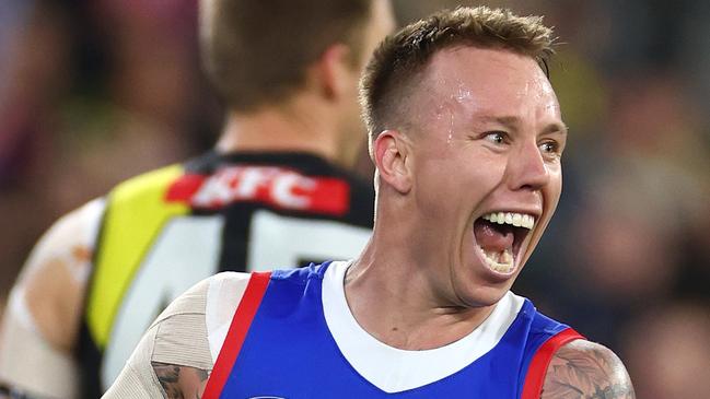 MELBOURNE, AUSTRALIA - MAY 11: James Harmes of the Bulldogs celebrates kicking a goal during the round nine AFL match between Richmond Tigers and Western Bulldogs at Melbourne Cricket Ground, on May 11, 2024, in Melbourne, Australia. (Photo by Quinn Rooney/Getty Images)