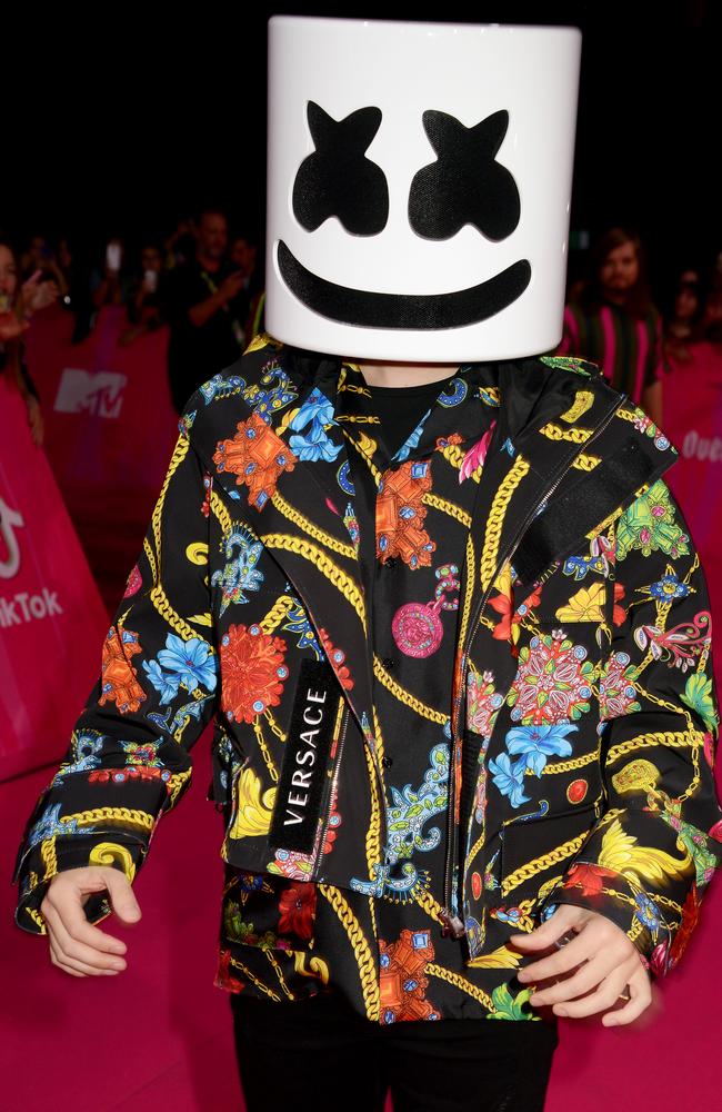 Marshmello’s helmet won’t distract us from the fact he seems to have left the tag on his jacket. Picture: Dave J Hogan/Dave J Hogan/Getty Images for MTV