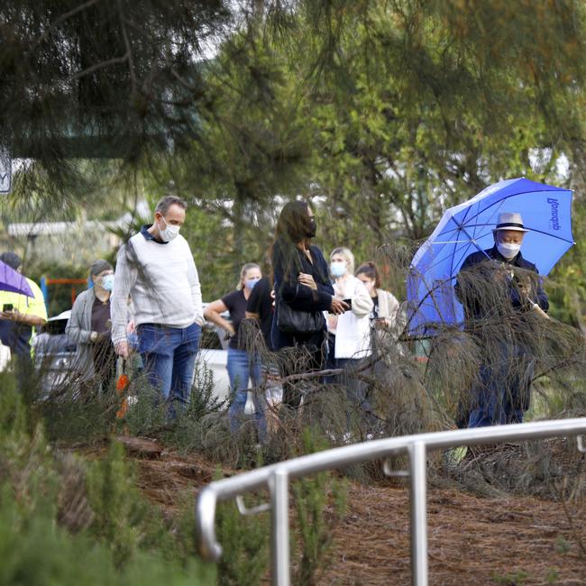Day 2 in lockdown. Members of the public line up to get tested for Covid at the Albert Waterways Community centre. Picture: Tertius Pickard