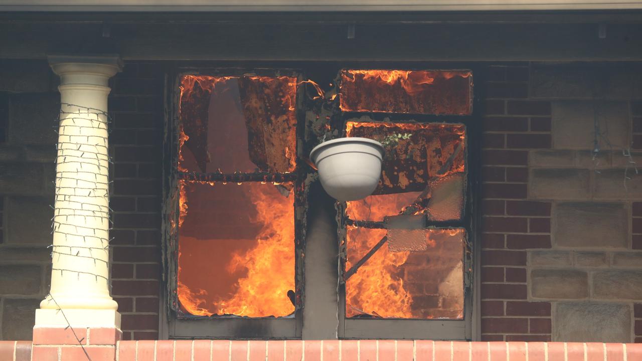 Fire ravages the interior of a home in the Cudlee Creek bushfire. Picture: Tait Schmaal