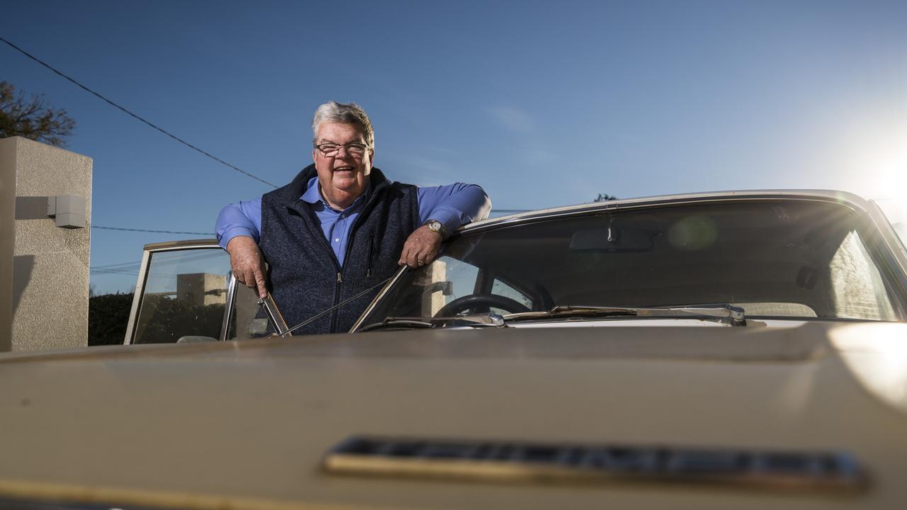 Derek Tuffield with his retirement restoration project, a Triumph car, as the Lifeline Darling Downs CEO announces his retirement. Picture: Kevin Farmer