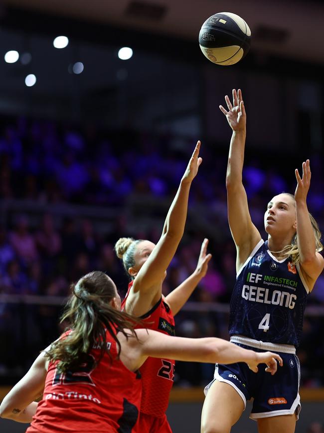 Geelong United’s Jaz Shelley (right) gets a shot up over Perth duo Amy Atwell and Mackenzie Clinch Hoycard. Picture: Mike Owen/Getty Images