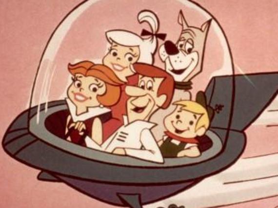 circa 1962: Cartoon family the Jetsons, comprised of George, Jane, Judy, Elroy, and Astro, flying in a space car in a space age city, in a still from the Hanna-Barbera animated television show, 'The Jetsons'. (Photo by Hulton Archive/Getty Images)