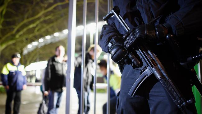 Police forces secure an entrance of the HDI-Arena prior the International Friendly match between Germany and Netherlands.