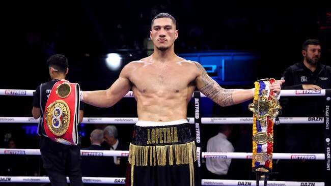 Jai Opetaia poses with his belts following the IBF World Cruiserweight Title Fight against Jordan Thompson. (Photo by Bradley Collyer/PA Images via Getty Images)